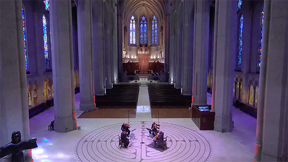 Alexander String Quartet performing in Grace Cathedral's vast space with soaring multi-story columns, stained glass and the indoor labyrinth.