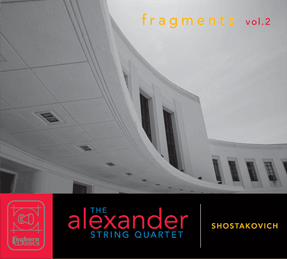 Cover photo for Fragments Vol. 2 shows a sweeping circular building, photo by Rory Earnshaw